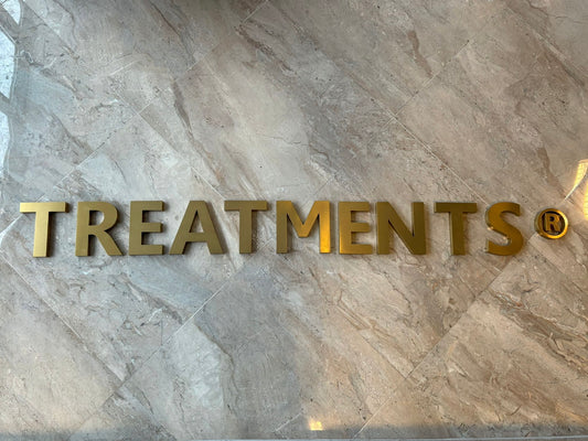 Gouden TREATMENTS® letters